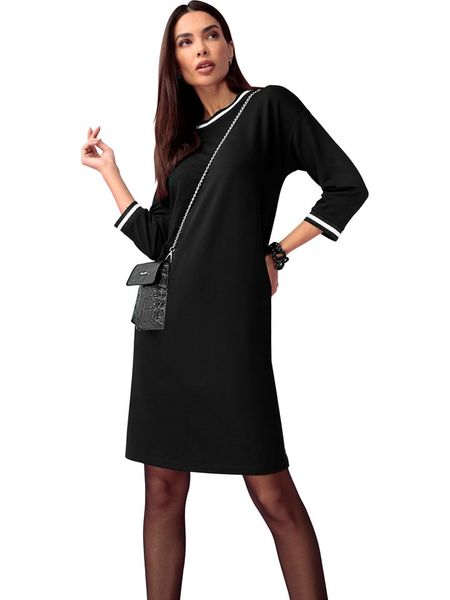 Heine Sukienka w kolorze czarnym rozmiar: 36. Czarne sukienki Heine, na co dzień, bez wzorów, bez kołnierzyka, bez ramiączek, midi, proste. Za 104,39 zł.