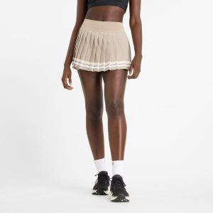 Spódnica damska New Balance WK51402ADS – beżowa. Brązowe spódnice New Balance, m, bez wzorów, z materiału. Za 229,99 zł.