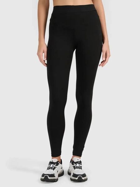Legginsy treningowe bawełniane damskie czarne 4F Czarny XS. Czarne legginsy 4f, bez wzorów, z bawełny. Za 63,99 zł.