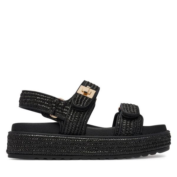 Sandały Steve Madden. Czarne sandały Steve Madden, bez wzorów, bez obcasa, na płaskiej podeszwie, bez zapięcia. Za 559,99 zł.