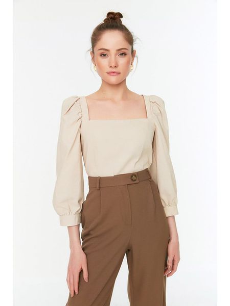Trendyol Bluzka w kolorze beżowym rozmiar: 34. Brązowe bluzki Trendyol, bez wzorów, z bawełny, bez kołnierzyka, bez ramiączek. Za 37,12 zł.