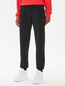 Guess Spodnie dresowe V4YB08 KCAY2 Czarny Regular Fit. Czarne spodnie dresowe Guess, xl, z aplikacjami, z dresówki. Za 239,99 zł.