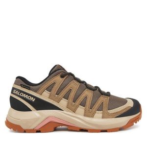 Trekkingi Salomon. Brązowe buty sportowe Salomon, bez wzorów, z gore-texu, bez zapięcia, trekkingowe, gore-tex. Za 449,99 zł.