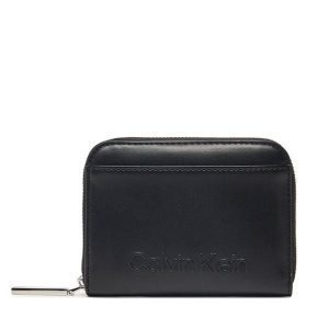 Portfel Calvin Klein. Czarne portfele Calvin Klein, bez wzorów. Za 159,99 zł.