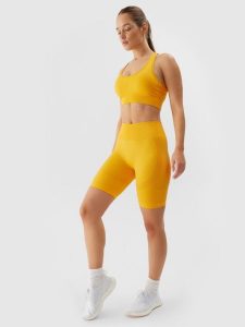 4F Legginsy krótkie bezszwowe treningowe damskie - pomarańczowe M/L. Brązowe legginsy 4f, bez wzorów, z dzianiny, z podwyższonym stanem, krótkie. W wyprzedaży za 39,99 zł.