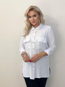 Klasycza biała koszula Cler z długim rękawem do pracy PLUS SIZE XXL. Białe koszule Nasi partnerzy, plus size, bez wzorów, z poliesteru, bez kołnierzyka, plus size, bez ramiączek. Za 199,90 zł.
