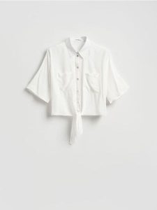 Koszula z wiskozy z wiązaniem - biały. Białe koszule Reserved, l, bez wzorów, z tkaniny, bez kołnierzyka, bez ramiączek. Za 89,99 zł.