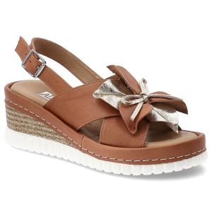 Sandały damskie Artiker, cholewka ze skóry naturalnej zapinane na sprzączkę z efektowną kokardą, brązowe, 58C3157. Brązowe sandały ARTIKER, bez wzorów, ze skóry, bez obcasa, na koturnie, bez zapięcia. Za 259,00 zł.