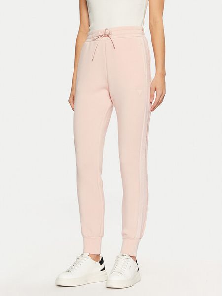 Guess Spodnie dresowe V2YB18 K7UW2 Różowy Regular Fit. Czerwone spodnie dresowe Guess, xl, z aplikacjami, z dresówki. Za 189,99 zł.