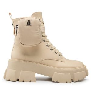 Trapery Steve Madden. Brązowe buty zimowe Steve Madden, bez obcasa, bez zapięcia. Za 699,99 zł.