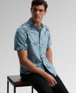 Superdry Koszula Vintage Loom krótki rękaw z bawełny organicznej. Niebieskie koszule Superdry, xl, bez wzorów, z bawełny, bez kołnierzyka, bez ramiączek. Za 229,00 zł.