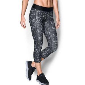 Legginsy damskie Under Armour HeatGear Capri Printed 7/8. Czarne legginsy Under Armour, bez wzorów. Za 219,00 zł.