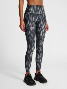 Damskie legginsy Hummel AOP Hiit Intensity. Szare legginsy Hummel, bez wzorów, z materiału, z standardowym stanem. Za 311,50 zł.