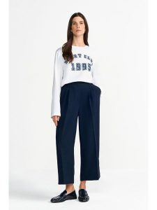 Rich & Royal Spodnie w kolorze granatowym rozmiar: 42. Niebieskie spodnie z wysokim stanem Rich & Royal, bez wzorów, z materiału, z podwyższonym stanem. Za 274,99 zł.