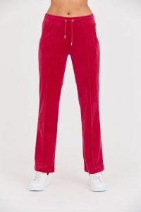 JUICY COUTURE Różowe spodnie dresowe Tina Track Pants. Czerwone spodnie dresowe Juicy Couture, s, bez wzorów, z dresówki. W wyprzedaży za 291,99 zł.
