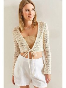 Bianco Lucci Kardigan w kolorze beżowym rozmiar: onesize. Brązowe kardigany Bianco Lucci, bez wzorów, ze splotem, bez ramiączek. Za 77,95 zł.