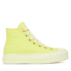 Trampki Converse. Żółte trampki Converse, bez wzorów, bez zapięcia. Za 289,99 zł.