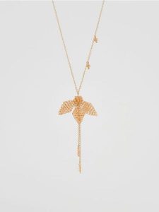 Naszyjnik z zawieszką - kremowy. Białe naszyjniki Reserved. Za 49,99 zł.