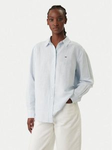 Tommy Jeans Koszula DW0DW22209 Błękitny Relaxed Fit. Niebieskie koszule Tommy Jeans, xxs, bez wzorów, z jeansu, bez kołnierzyka, bez ramiączek. Za 409,99 zł.