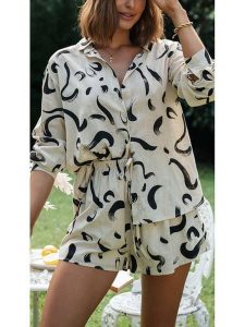 LA Angels 2-częściowy zestaw w kolorze kremowym rozmiar: M. Brązowe szorty LA Angels, bez wzorów. Za 165,99 zł.