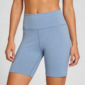 Krótkie legginsy Softee Session Azul Acero. Niebieskie legginsy SOFTEE, bez wzorów, z elastanu, z podwyższonym stanem, krótkie. Za 160,99 zł.