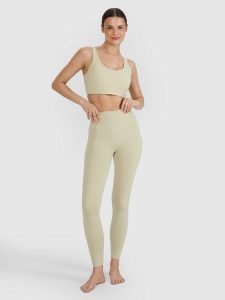 Legginsy do jogi i pilatesu szybkoschnące damskie 4F 4FWSS25TFTIF323. Zielone legginsy 4f, bez wzorów, z dzianiny, z podwyższonym stanem, długie. Za 91,99 zł.