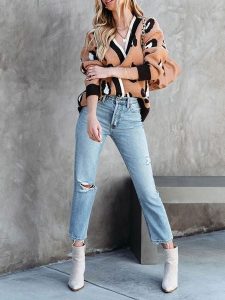 Milan Kiss Kardigan w kolorze jasnobrązowo-czarno-kremowym rozmiar: S. Brązowe kardigany Milan Kiss. Za 170,47 zł.