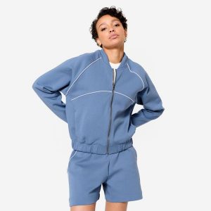Bluza fitness bomberka damska Domyos. Niebieskie bluzy DOMYOS, xl, bez wzorów, z bawełny, bez kaptura. W wyprzedaży za 119,99 zł.