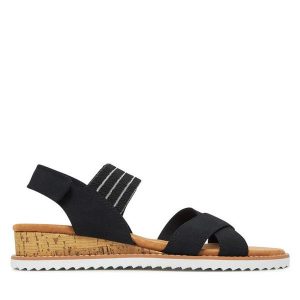 Sandały Skechers. Czarne sandały Skechers, bez wzorów, bez obcasa, na koturnie, bez zapięcia. Za 129,99 zł.