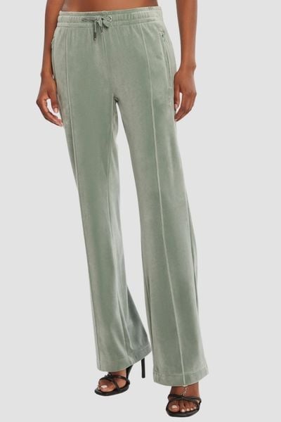 JUICY COUTURE Zielone damskie spodnie z cyrkoniami Tina, Rozmiar M. Zielone spodnie dresowe Juicy Couture, m, bez wzorów, z dresówki. W wyprzedaży za 212,99 zł.