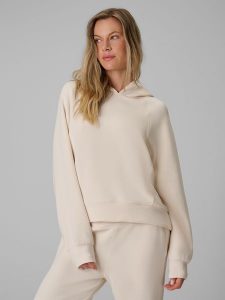 4F Bluza dresowa regular z modalem damska - kremowa XL. Brązowe bluzy 4f, xl, bez wzorów, z dresówki, z kapturem. Za 199,99 zł.