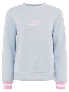 Zwillingsherz Bluza "Smile Everyday" w kolorze błękitnym rozmiar: L/XL. Niebieskie bluzy Zwillingsherz, l, bez wzorów, bez kaptura. Za 169,95 zł.