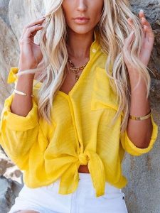 Milan Kiss Bluzka w kolorze żółtym rozmiar: XL. Żółte bluzki Milan Kiss, xl, bez wzorów, z bawełny, bez kołnierzyka, bez ramiączek. Za 135,49 zł.