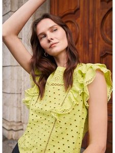 STEFANEL Bluzka w kolorze żółtym rozmiar: L. Żółte bluzki Stefanel, l, bez wzorów, z bawełny, bez kołnierzyka, bez ramiączek. Za 109,26 zł.