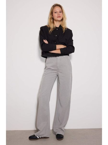 Trendyol Spodnie w kolorze szarym rozmiar: 36. Szare spodnie z wysokim stanem Trendyol, bez wzorów, z lyocellu, z podwyższonym stanem. Za 100,28 zł.