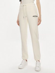 Tommy Hilfiger Spodnie dresowe Monotype WW0WW41572 Beżowy Regular Fit. Brązowe spodnie dresowe TOMMY HILFIGER, s, bez wzorów, z bawełny. Za 389,99 zł.