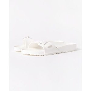 Klapki damskie Birkenstock Eva Madrid. Białe klapki Birkenstock, bez wzorów, z materiału, bez obcasa. Za 276,00 zł.
