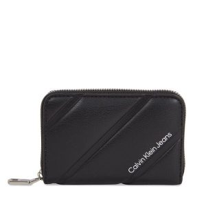 Portfel Calvin Klein Jeans. Czarne portfele Calvin Klein Jeans, bez wzorów, z jeansu. Za 239,99 zł.