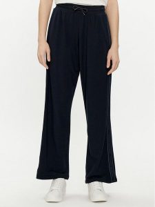 Tommy Hilfiger Spodnie dresowe UW0UW04771 Granatowy Relaxed Fit. Niebieskie spodnie dresowe TOMMY HILFIGER, m, bez wzorów, z dresówki. Za 269,99 zł.