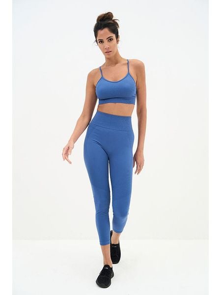 Onamaste Legginsy sportowe w kolorze niebieskim rozmiar: L/XL. Niebieskie legginsy Onamaste, bez wzorów, z materiału, z podwyższonym stanem. Za 147,95 zł.