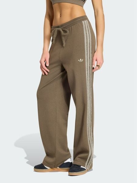 Adidas Spodnie dresowe Firebird KS7362 Brązowy Regular Fit. Brązowe spodnie dresowe ADIDAS, xs, bez wzorów, z dresówki. Za 314,99 zł.