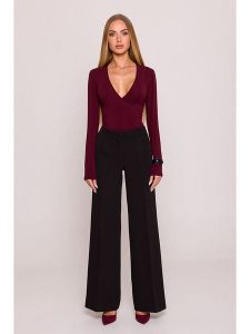 Made of emotion Spodnie w kolorze czarnym rozmiar: L. Czarne spodnie z wysokim stanem Made Of Emotion, bez wzorów, z materiału, z podwyższonym stanem. Za 223,46 zł.