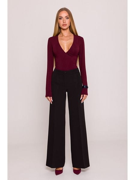 Made of emotion Spodnie w kolorze czarnym rozmiar: M. Czarne spodnie z wysokim stanem Made Of Emotion, bez wzorów, z materiału, z podwyższonym stanem. Za 196,24 zł.