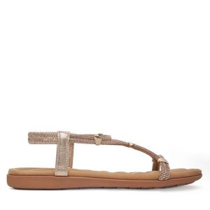 Sandały Clara Barson. Żółte sandały Clara Barson, bez wzorów, bez obcasa, na płaskiej podeszwie, bez zapięcia. Za 99,99 zł.