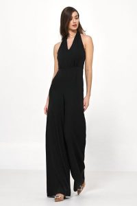 Elegancki Kombinezon Zapinany na Karku - Czarny. Czarne kombinezony Nife, xl, bez wzorów, z elastanu, eleganckie, bez kołnierzyka, bez ramiączek. Za 249,90 zł.