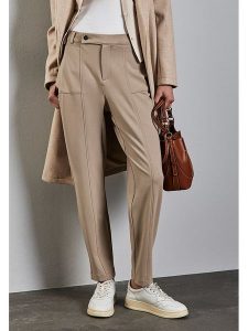 Street One Spodnie dresowe - Tapered fit - w kolorze beżowym rozmiar: 44/L30. Brązowe spodnie dresowe Street One, l, bez wzorów, z dresówki. Za 226,45 zł.