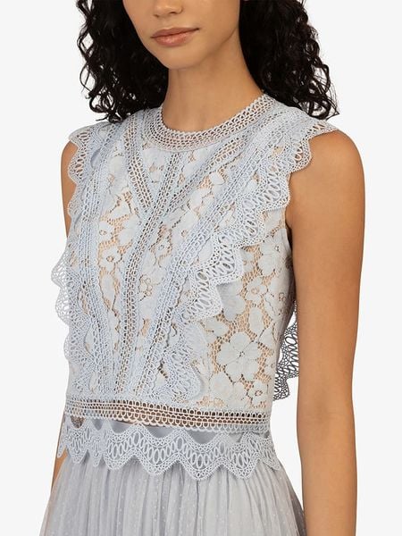 APART Top w kolorze błękitnym rozmiar: 40. Niebieskie topy Apart, bez wzorów, z koronki, bez kołnierzyka, bez ramiączek. Za 170,87 zł.