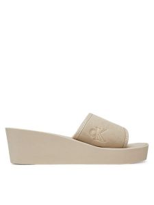 Calvin Klein Jeans Klapki Beach Wedge Slide Canvas YW0YW01725 Beżowy. Brązowe klapki Calvin Klein Jeans, bez wzorów, z jeansu, bez obcasa. Za 139,99 zł.