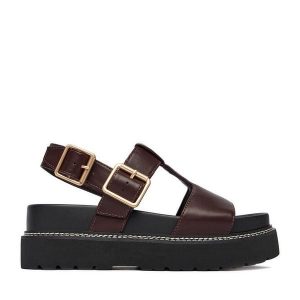 Sandały JENNY. Czerwone sandały Jenny, bez wzorów, bez obcasa, na koturnie, bez zapięcia. Za 159,99 zł.