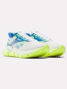 Reebok Buty "Floatzig 1" w kolorze biało-turkusowo-niebieskim do biegania rozmiar: 40. Białe buty sportowe Reebok, bez wzorów, z materiału, bez zapięcia, do biegania. Za 404,10 zł.
